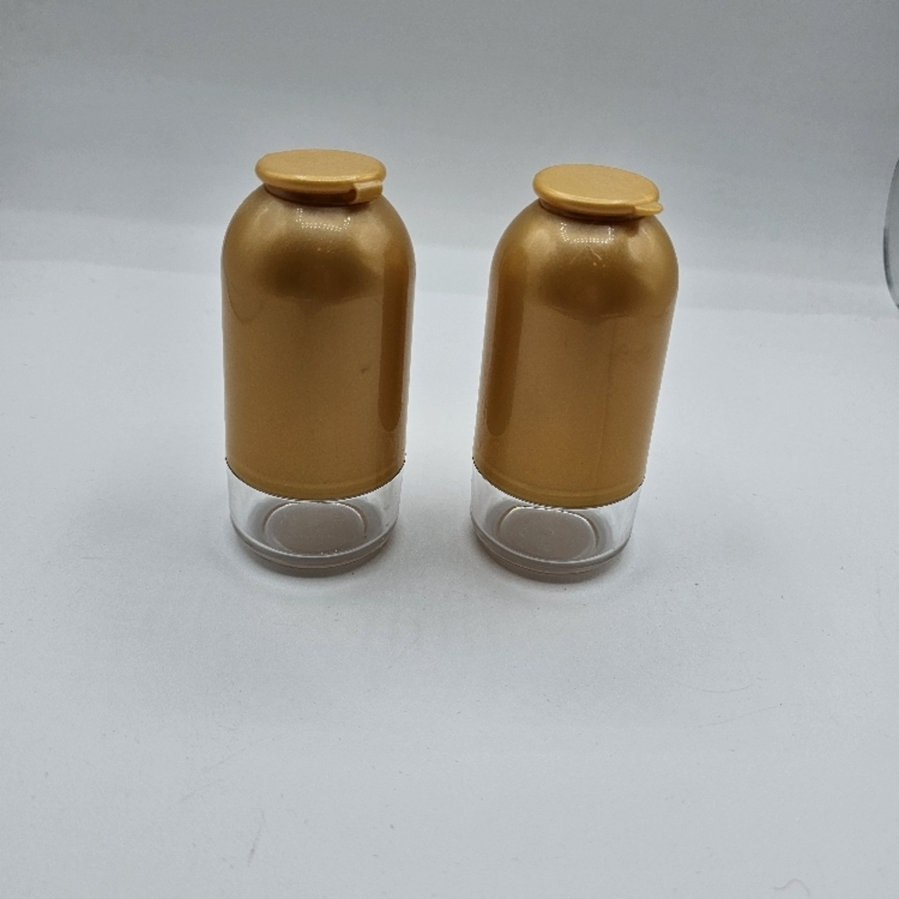 Tupperware Vintage Gold and Clear Salt & Pepper Shakers